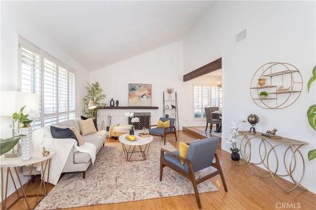 2217 E Brower St, Simi Valley, CA 93065 - living room with wood finished floors, high vaulted ceiling, and a chandelier
