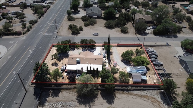 7323 Oakwood Ave, Hesperia, CA 92345 - aerial perspective of suburban area with property boundaries highlighted and a major roadway