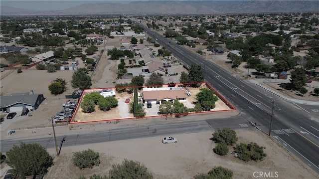 7323 Oakwood Ave, Hesperia, CA 92345 - aerial overview of property's location featuring mountains and property parcel outlined
