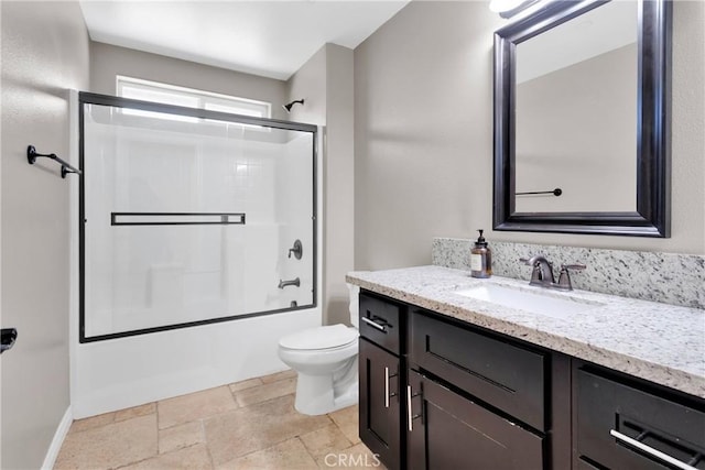 8383 Buckthorn Ave, Hesperia, CA 92345 - full bathroom with vanity, combined bath / shower with glass door, and stone tile flooring