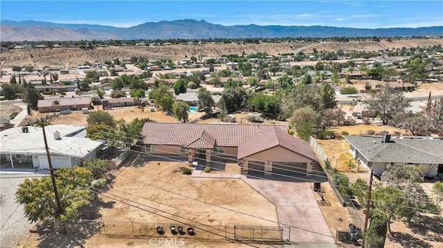 8383 Buckthorn Ave, Hesperia, CA 92345 - aerial view of residential area with a mountainous background