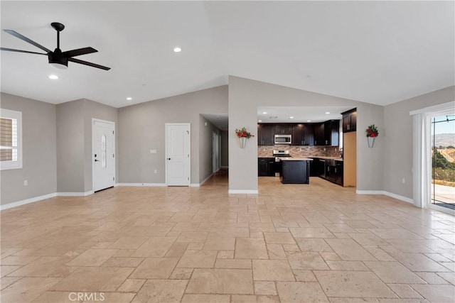 8383 Buckthorn Ave, Hesperia, CA 92345 - unfurnished living room with stone tile floors, lofted ceiling, a ceiling fan, and recessed lighting