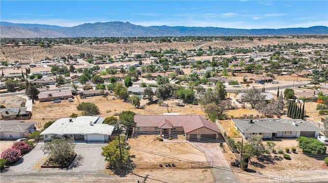 8383 Buckthorn Ave, Hesperia, CA 92345 - aerial perspective of suburban area featuring mountains and a desert landscape