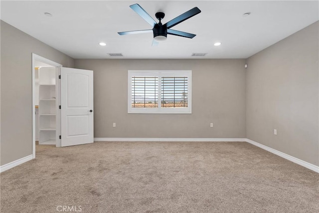 8383 Buckthorn Ave, Hesperia, CA 92345 - unfurnished bedroom featuring light carpet, recessed lighting, a spacious closet, and a ceiling fan