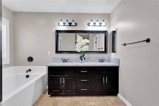 8383 Buckthorn Ave, Hesperia, CA 92345 - bathroom with double vanity, a garden tub, and tile patterned floors