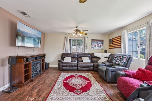 481 S Cedar Dr, Covina, CA 91723 - living area with dark wood finished floors, plenty of natural light, and ceiling fan