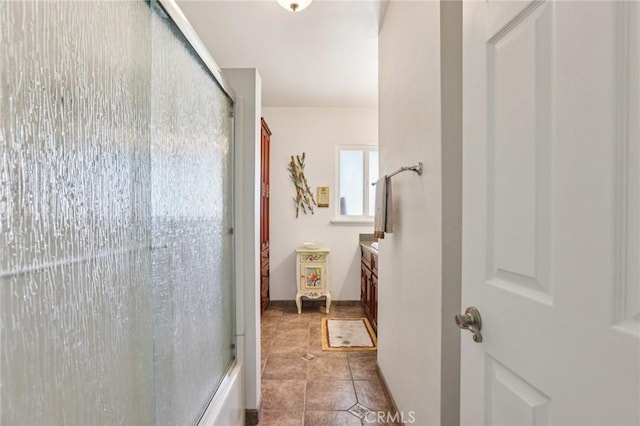 481 S Cedar Dr, Covina, CA 91723 - full bath featuring vanity, tile patterned flooring, and shower / bath combination with glass door