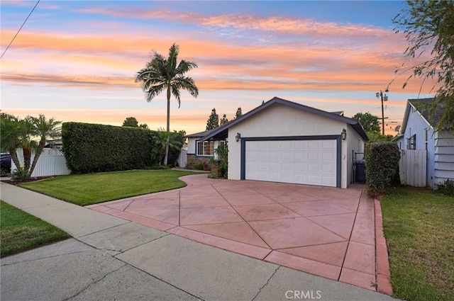 481 S Cedar Dr, Covina, CA 91723 - view of front of home featuring driveway, an attached garage, and stucco siding