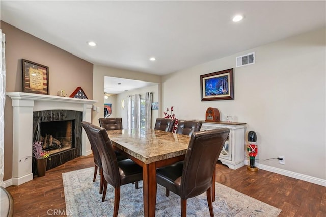 481 S Cedar Dr, Covina, CA 91723 - dining area featuring dark wood-type flooring, a fireplace, and recessed lighting