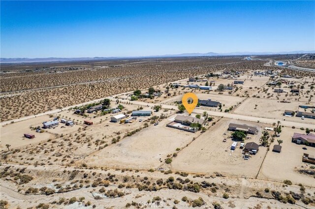 13212 Primavera Rd, Pinon Hills, CA 92372 - aerial view of sparsely populated area featuring a desert landscape and mountains