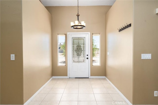 13212 Primavera Rd, Pinon Hills, CA 92372 - foyer with a chandelier and light tile patterned flooring