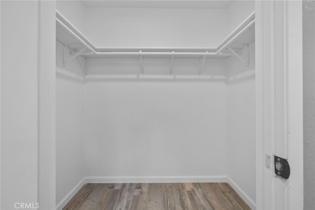 6831 Valinda Ave, Rancho Cucamonga, CA 91701 - spacious closet featuring wood finished floors