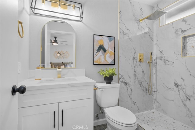 6831 Valinda Ave, Rancho Cucamonga, CA 91701 - bathroom featuring a marble finish shower, vanity, and ceiling fan