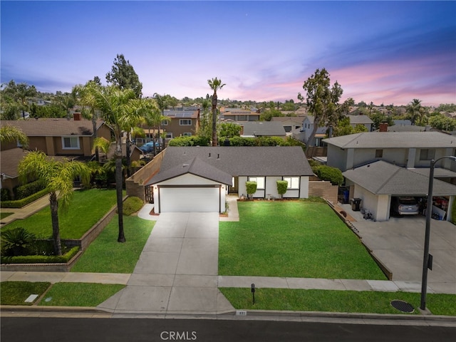 6831 Valinda Ave, Rancho Cucamonga, CA 91701 - single story home featuring a residential view, a front lawn, concrete driveway, and a garage