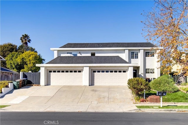 33621 Blue Lantern St, Dana Point, CA 92629 - view of front facade featuring stucco siding, driveway, and an attached garage