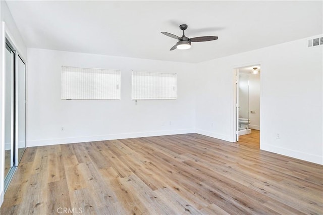 33621 Blue Lantern St, Dana Point, CA 92629 - unfurnished bedroom with light wood finished floors, connected bathroom, a closet, and ceiling fan