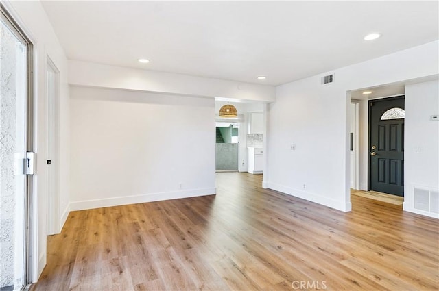 33621 Blue Lantern St, Dana Point, CA 92629 - empty room with light wood finished floors and recessed lighting