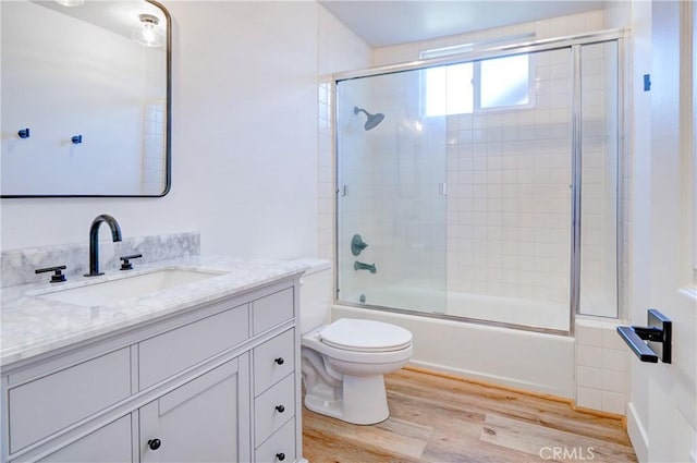 33621 Blue Lantern St, Dana Point, CA 92629 - bathroom featuring wood finished floors, vanity, and combined bath / shower with glass door