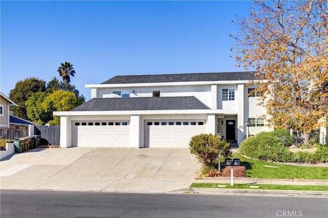 33621 Blue Lantern St, Dana Point, CA 92629 - view of front of property featuring stucco siding, driveway, and a garage