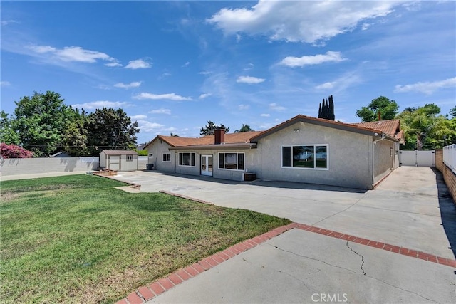 2521 Double Tree Ln, Rowland Heights, CA 91748 - rear view of property with a shed, a patio, a fenced backyard, and stucco siding