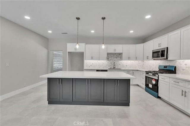 2521 Double Tree Ln, Rowland Heights, CA 91748 - kitchen with appliances with stainless steel finishes, a kitchen island, white cabinetry, backsplash, and light countertops