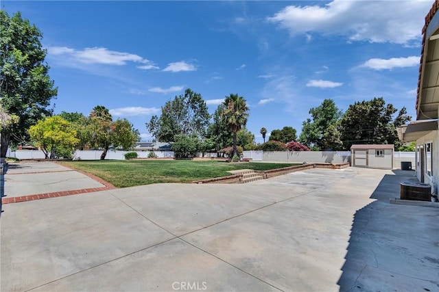 2521 Double Tree Ln, Rowland Heights, CA 91748 - view of yard with a shed, driveway, and a patio area