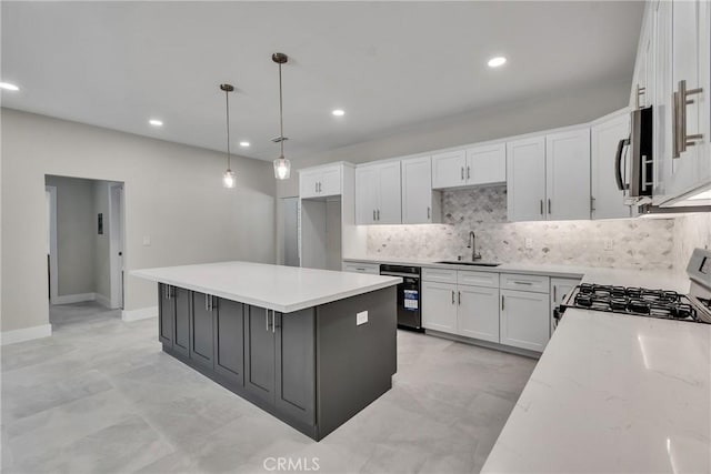 2521 Double Tree Ln, Rowland Heights, CA 91748 - kitchen with gas range oven, black dishwasher, stainless steel microwave, white cabinetry, and backsplash