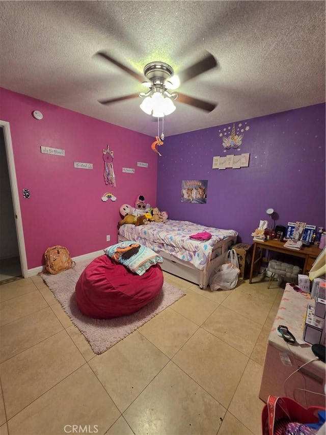 11815 Arliss Way, Grand Terrace, CA 92313 - bedroom with light tile patterned flooring, a textured ceiling, and ceiling fan