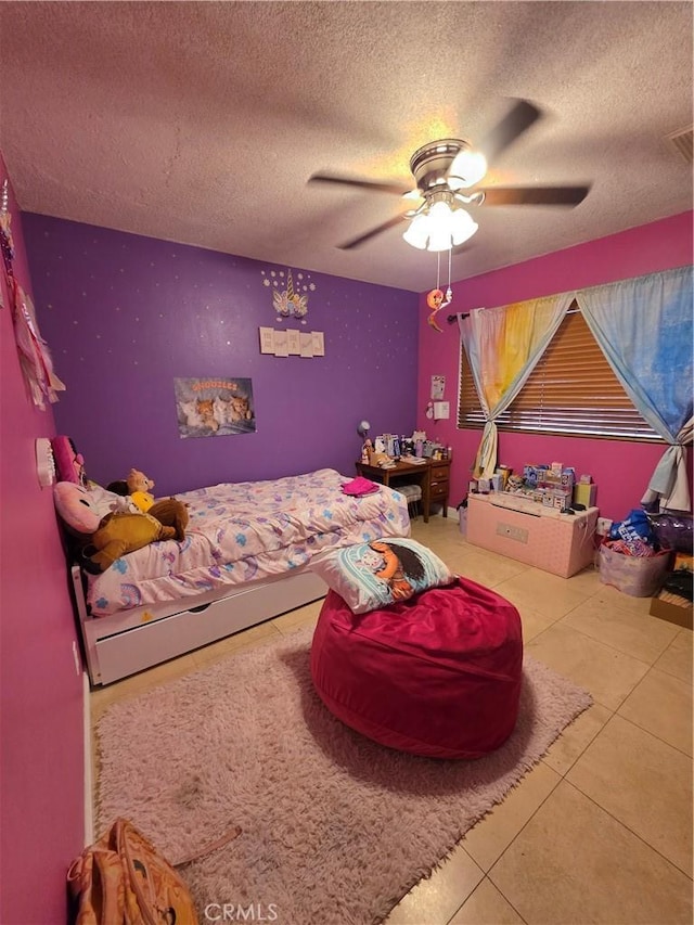11815 Arliss Way, Grand Terrace, CA 92313 - tiled bedroom featuring a textured ceiling and a ceiling fan