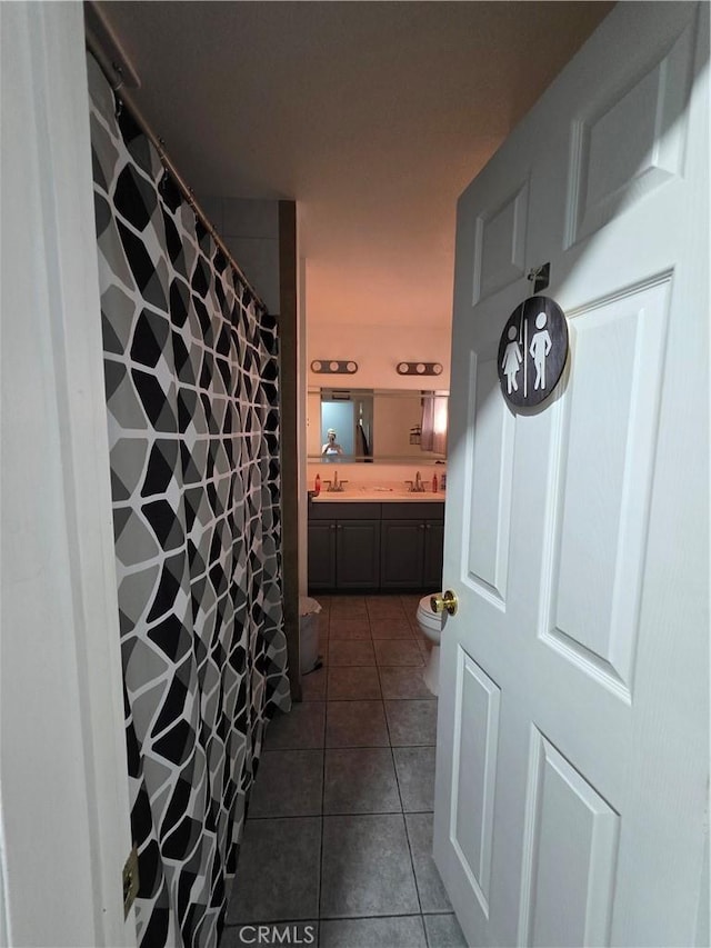 11815 Arliss Way, Grand Terrace, CA 92313 - full bath with tile patterned flooring, double vanity, and a shower with shower curtain