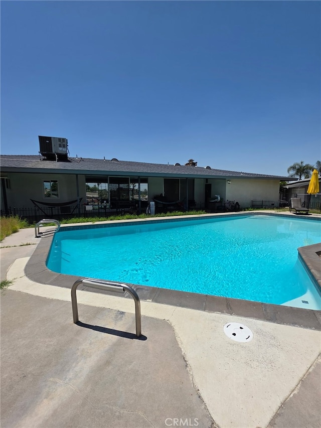 11815 Arliss Way, Grand Terrace, CA 92313 - view of swimming pool with a patio