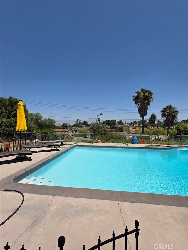11815 Arliss Way, Grand Terrace, CA 92313 - view of swimming pool featuring a patio area