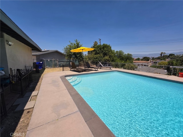 11815 Arliss Way, Grand Terrace, CA 92313 - view of swimming pool featuring a fenced backyard and a patio