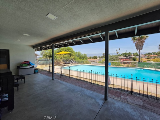 11815 Arliss Way, Grand Terrace, CA 92313 - view of swimming pool with a patio area