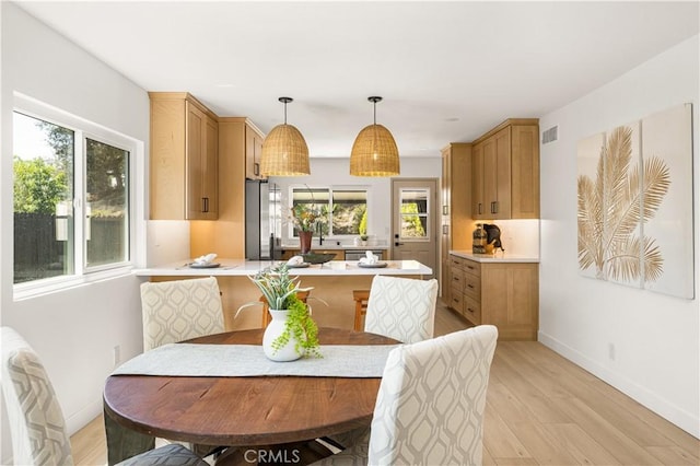 26871 Via Santa Lucia, Mission Viejo, CA 92691 - dining room featuring healthy amount of natural light and light wood-style floors