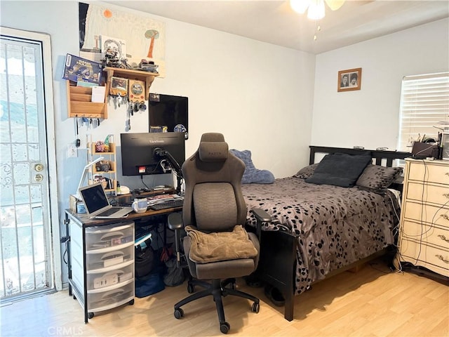 516 N Brand Blvd, San Fernando, CA 91340 - bedroom with wood finished floors, an office area, and access to exterior