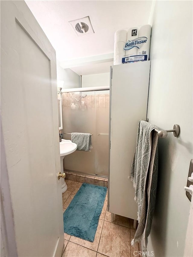 516 N Brand Blvd, San Fernando, CA 91340 - bathroom featuring tile patterned flooring and a shower