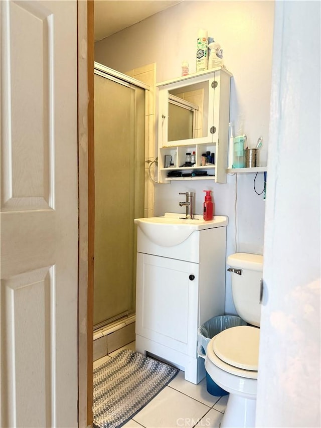 516 N Brand Blvd, San Fernando, CA 91340 - bathroom featuring tile patterned floors, vanity, and a shower stall