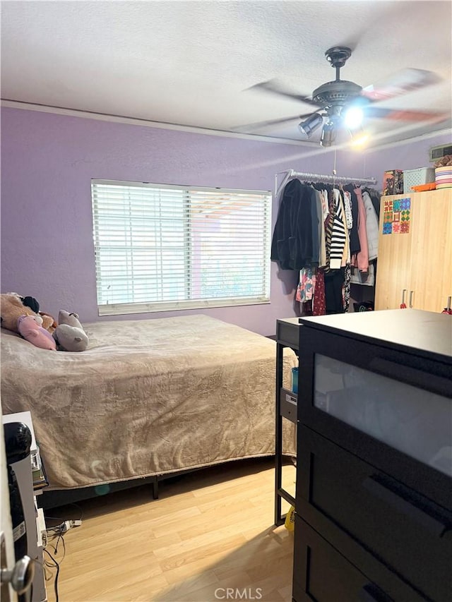 516 N Brand Blvd, San Fernando, CA 91340 - bedroom with light wood finished floors and a ceiling fan