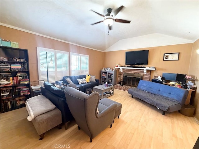 516 N Brand Blvd, San Fernando, CA 91340 - living room featuring ceiling fan, wood finished floors, lofted ceiling, and a fireplace