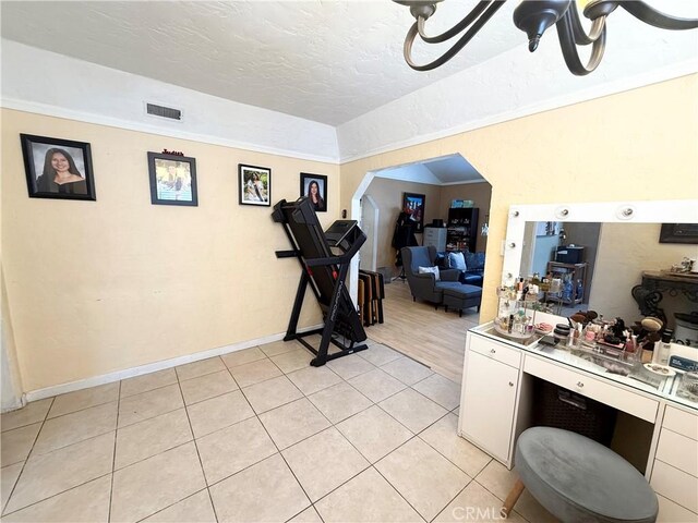516 N Brand Blvd, San Fernando, CA 91340 - exercise area with light tile patterned floors and lofted ceiling