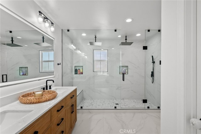 17656 Gladesworth Ln, Canyon Country, CA 91387 - bathroom featuring a marble finish shower, marble look tiles, double vanity, healthy amount of natural light, and recessed lighting