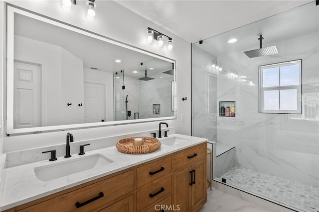 17656 Gladesworth Ln, Canyon Country, CA 91387 - bathroom featuring a marble finish shower, double vanity, marble finish flooring, and recessed lighting