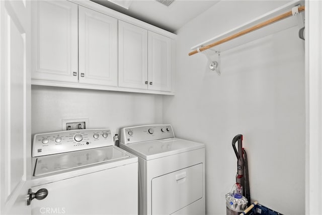 17656 Gladesworth Ln, Canyon Country, CA 91387 - laundry room featuring cabinet space and washing machine and dryer