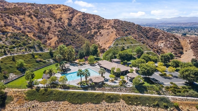 17656 Gladesworth Ln, Canyon Country, CA 91387 - drone / aerial view of a pool and a mountainous background
