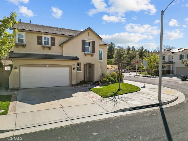 17656 Gladesworth Ln, Canyon Country, CA 91387 - traditional-style home featuring stucco siding, a garage, and concrete driveway
