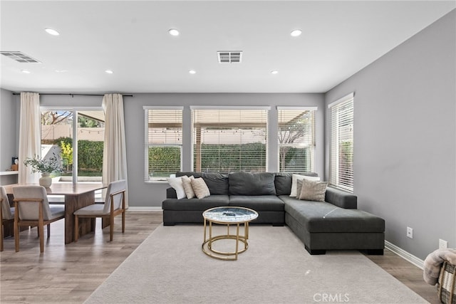 17656 Gladesworth Ln, Canyon Country, CA 91387 - living area with healthy amount of natural light, light wood-style flooring, and recessed lighting
