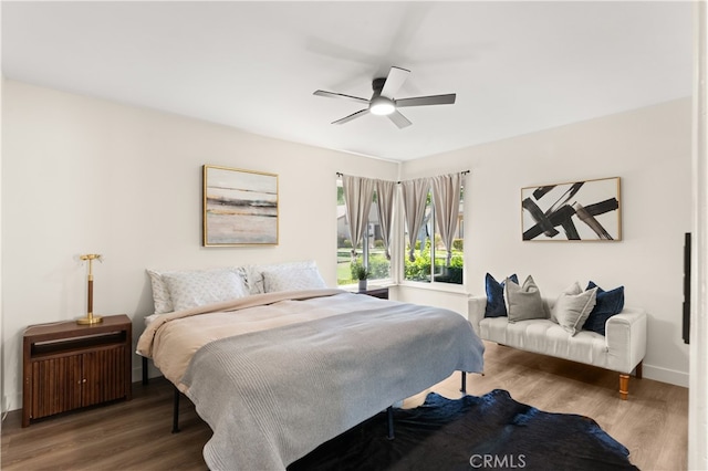 341 Carriage Dr Unit 51-A, Santa Ana, CA 92707 - bedroom featuring wood finished floors and a ceiling fan