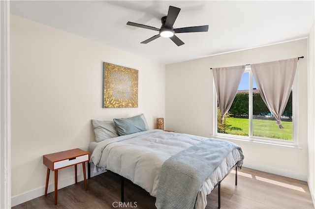 341 Carriage Dr Unit 51-A, Santa Ana, CA 92707 - bedroom with wood finished floors and ceiling fan