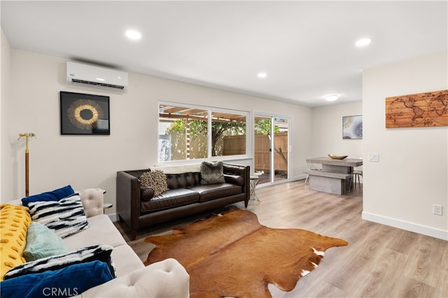 341 Carriage Dr Unit 51-A, Santa Ana, CA 92707 - living area featuring a wall mounted air conditioner, wood finished floors, and recessed lighting